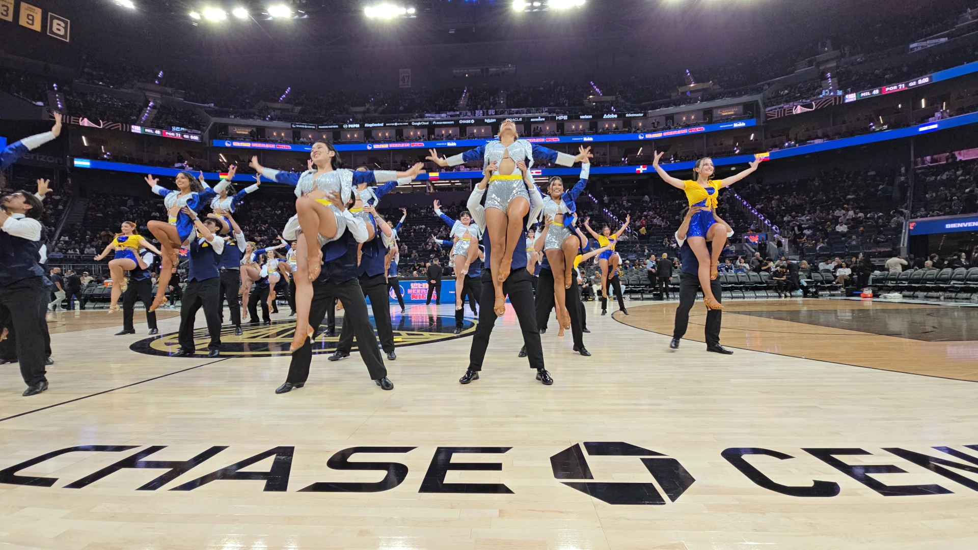 A dance team performing at Chase Center
